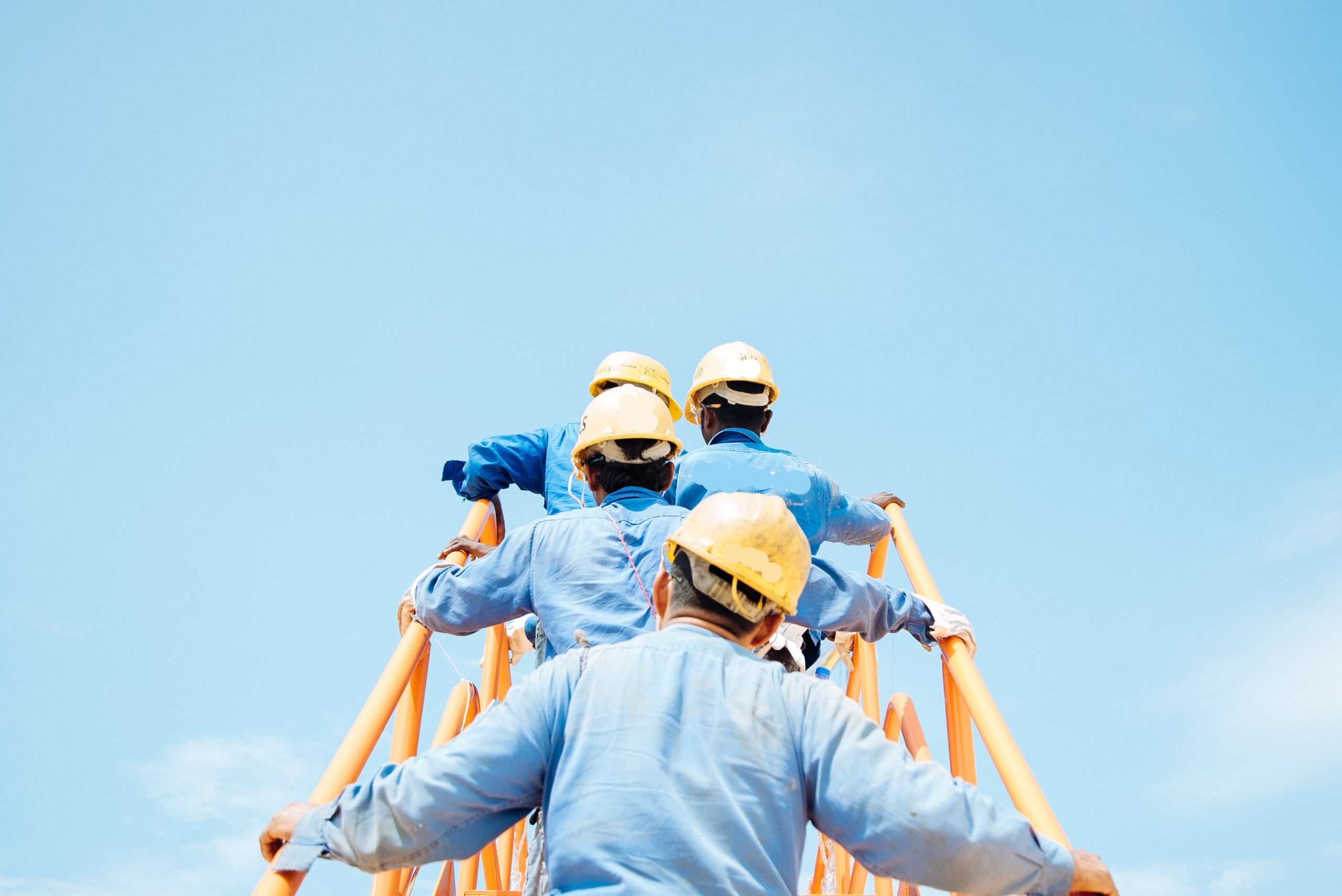 sol-tZw3fcjUIpM-unsplash.jpg Shot of a group of young businesspeople walking upstairs in a modern office