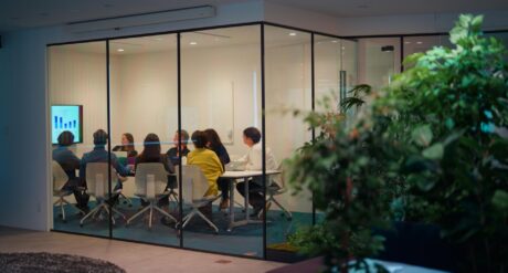 A meeting discussing the Building Safety Act in a sustainable office.