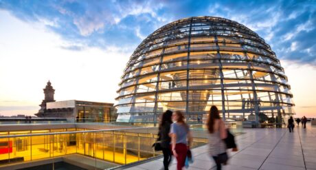 People walk past a Dome in Berlin, with precise measurements according to NRM